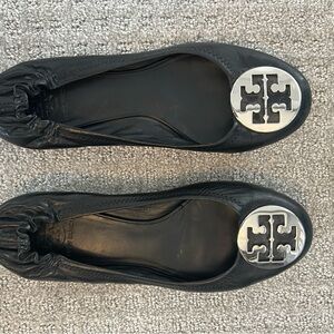Tory Burch Black Flats with Silver Emblem